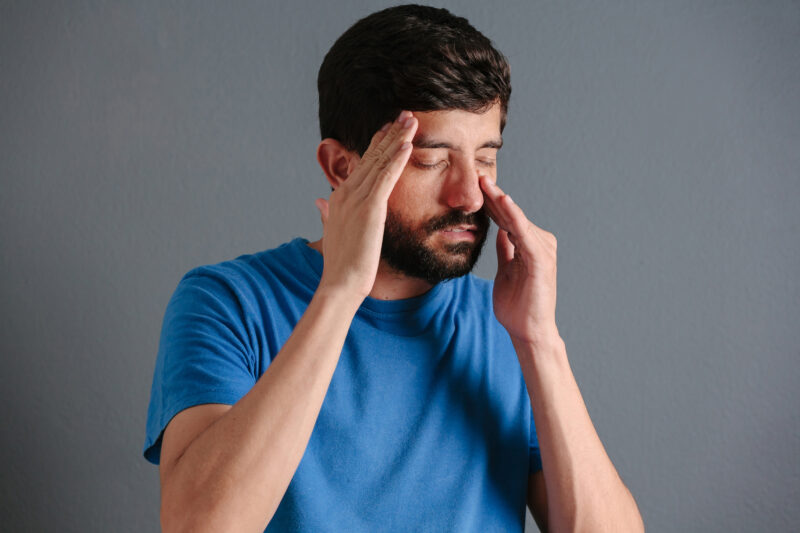 Man suffering from pain due to possible Sinusitis