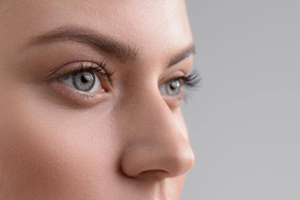 young woman looking forward with beautiful eyes
